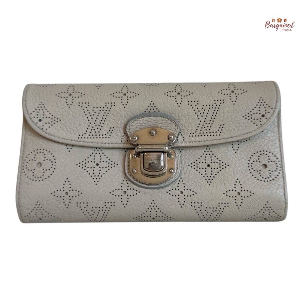 Authentic Louis Vuitton Cream Perforated Monogram Mahina Amelia Long Wallet